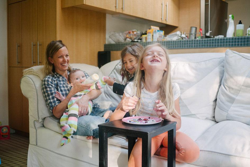 He and his wife, Sarah, get the oldest two ready to go.