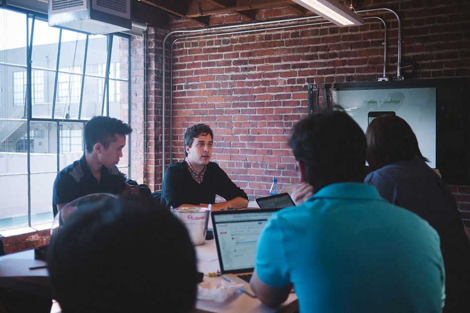 Meetings take place everywhere —&nbsp;from the lounge spaces to glass offices.&nbsp;One of the core company values is “knit”, which loosely translates to “collaboration”, so you’ll often find teams across disciplines working together. &nbsp;Meeting rooms were named by employees and represent popular pins, such as Kale Chips, Hipster Babies and DIY.